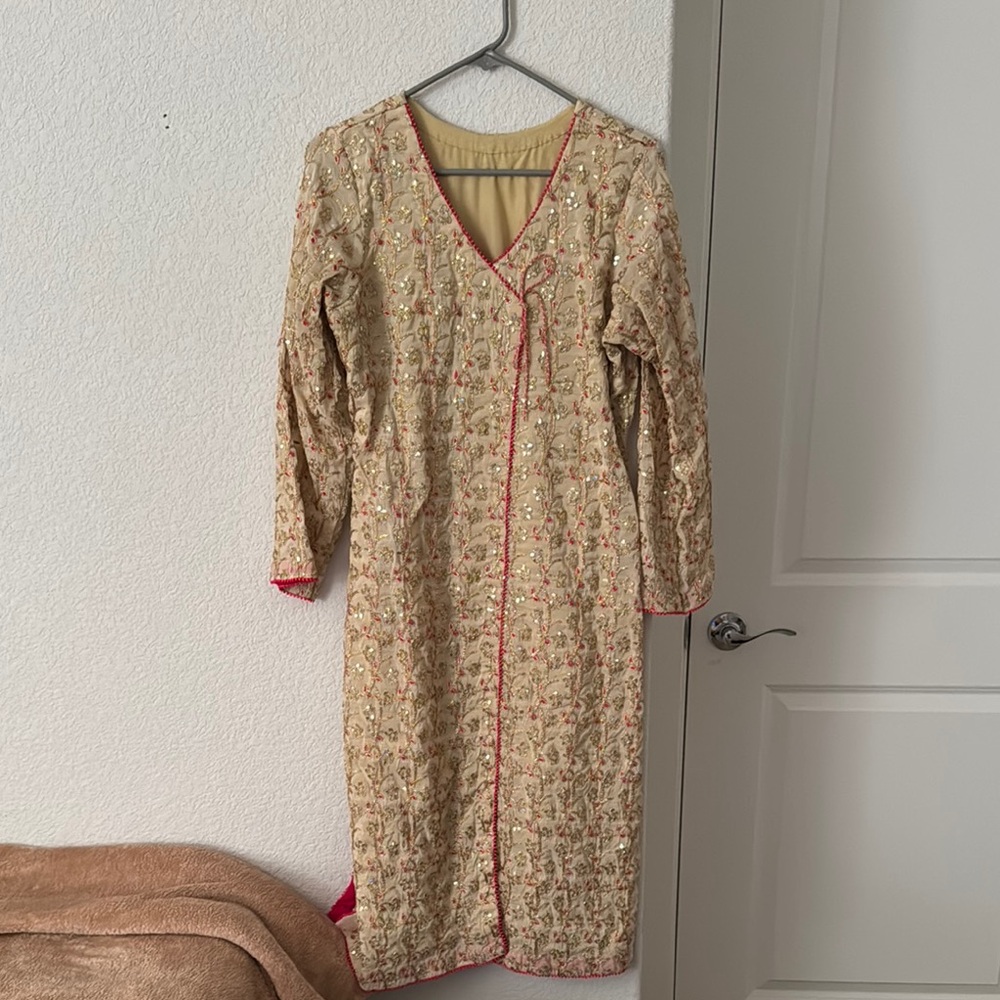 Elegant Beige Dress with Red Accents